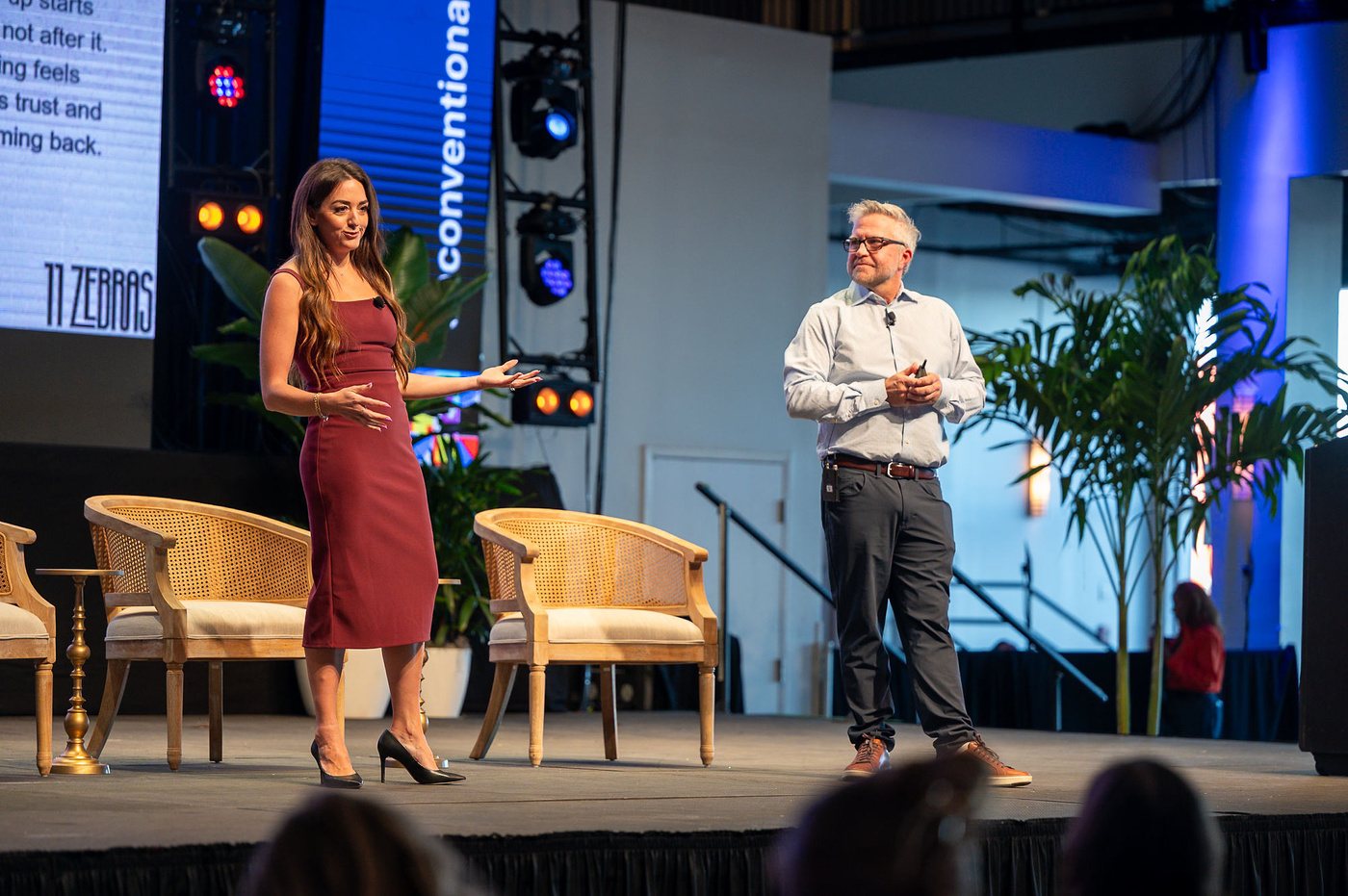 Julie Teplitzky and Chris Metzger presenting on stage